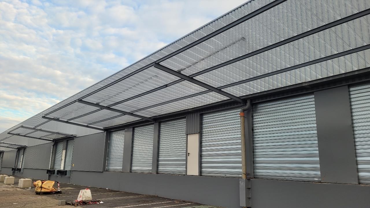 LIMITE ROUEN / PETIT QUEVILLY - ENTREPOT A QUAIS.