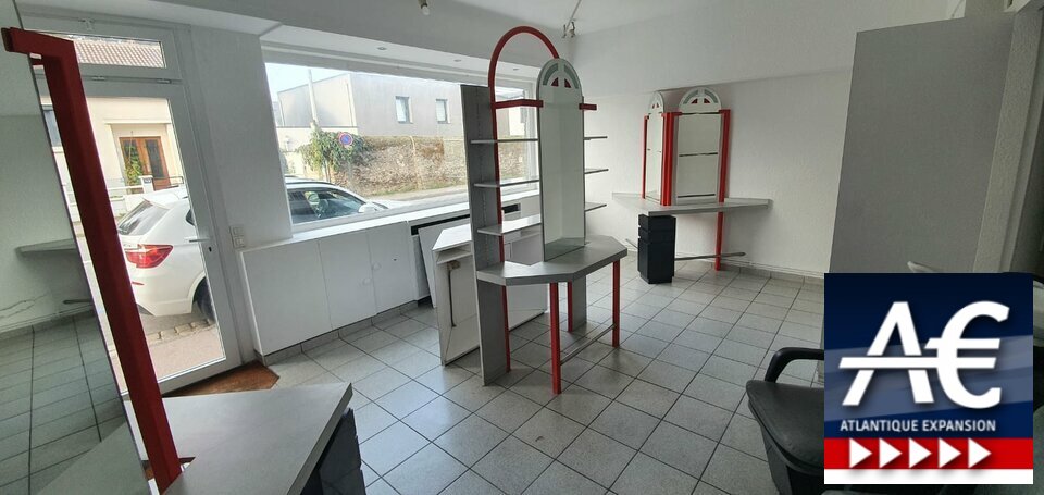 A VENDRE LOCAL COMMERCIAL ET LOGEMENT
